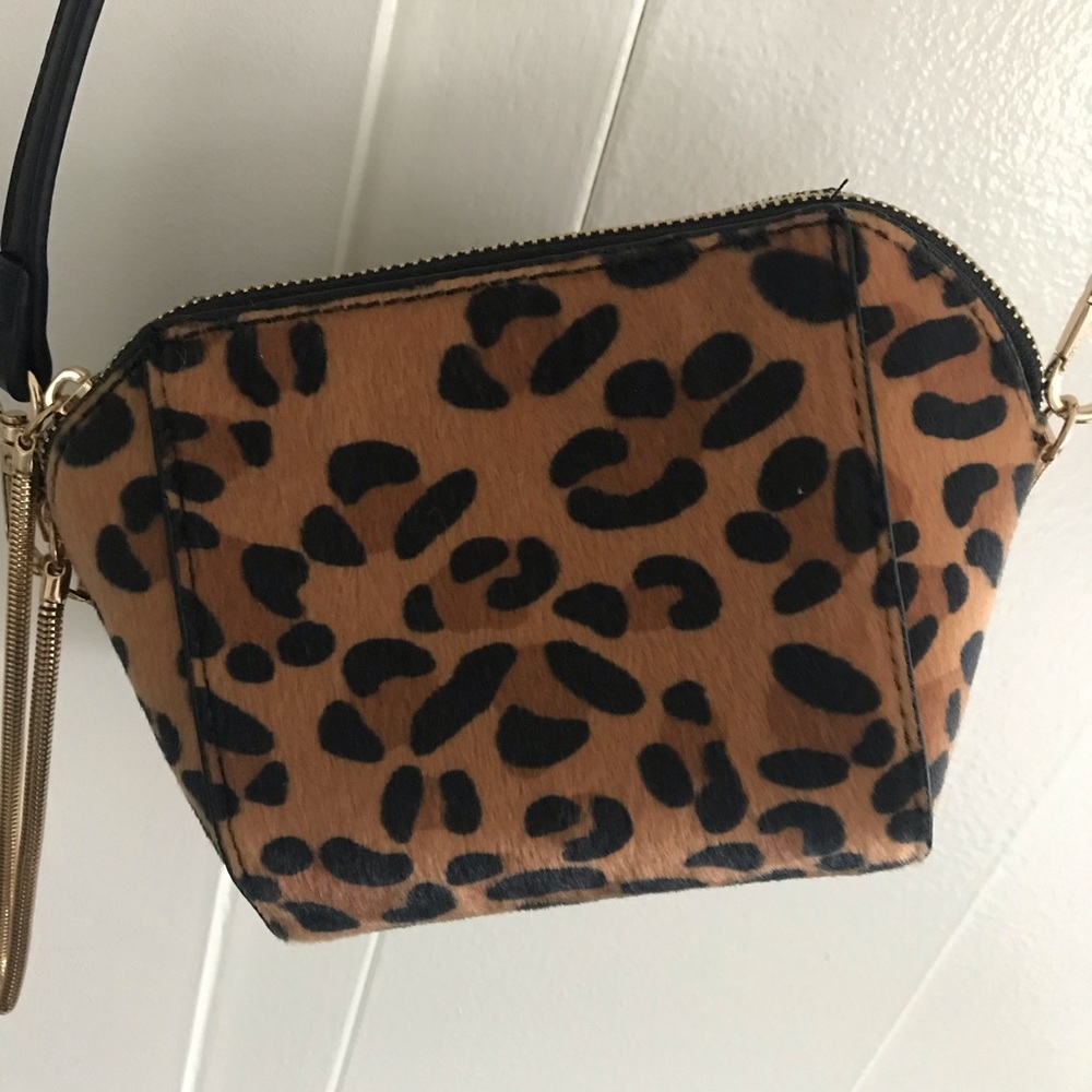 Anthropologie Leopard cross body pouch bag
